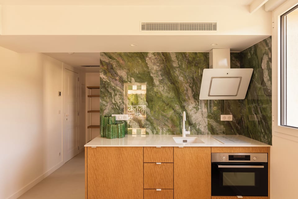 Signature Apartment | Private kitchen | Mini-fridge, espresso maker, cookware/dishes/utensils, paper towels
