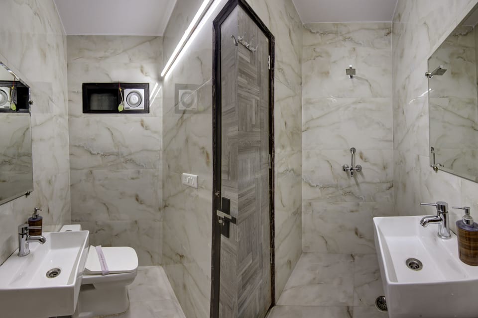 Deluxe Double Room | Bathroom | Shower, designer toiletries, hair dryer, slippers