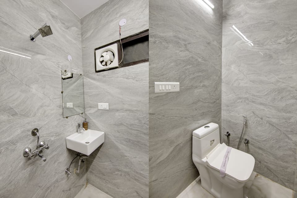 Deluxe Double Room | Bathroom | Shower, designer toiletries, hair dryer, slippers