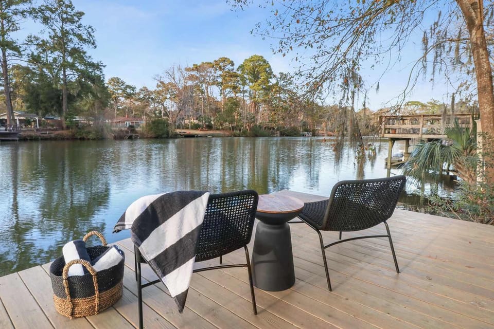 Backyard | Private Lakefront View with Seating | Private Outdoor Area