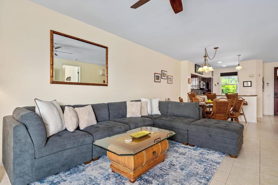 Cozy sectional anchors the open concept living area.