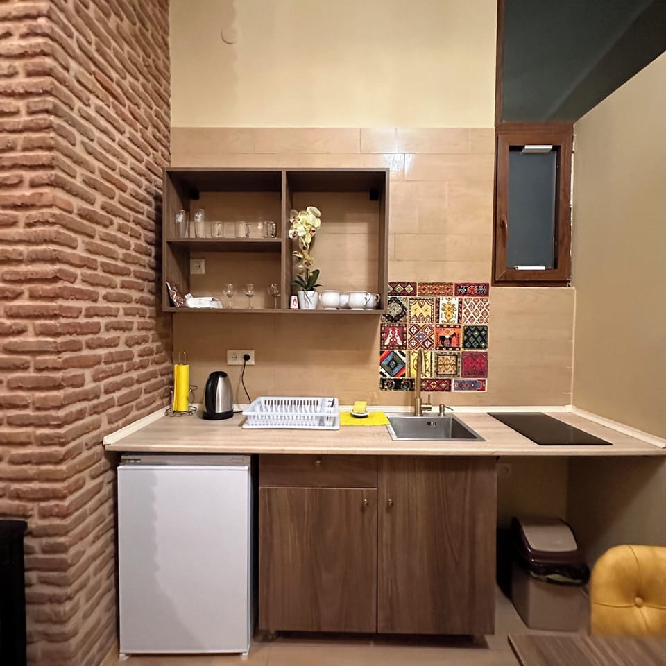 Luxury 2-bdr Apartment Historic Building | Private kitchen | Fridge, microwave, stovetop, electric kettle