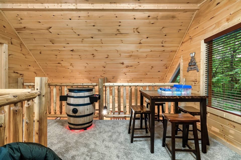 Another angle of the loft area where the twin bunk beds are (also considered bed #3).  Kids of all ages love the multi-arcade barrel.  