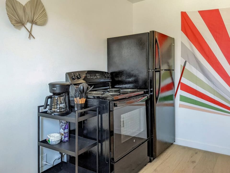 Compact kitchen with cooking essentials