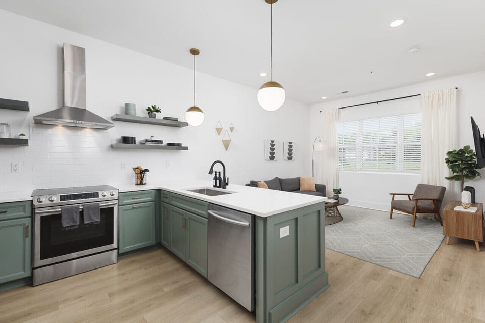 Fully-stocked kitchen with all the appliances, dishware, utensils, and spices you'd need for a great meal. Open floor plan with lots of space and natural light.