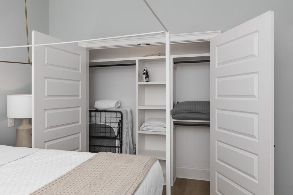 Comfortable king bed in bedroom #2. Plenty of closet space, plus an iron & ironing board available.