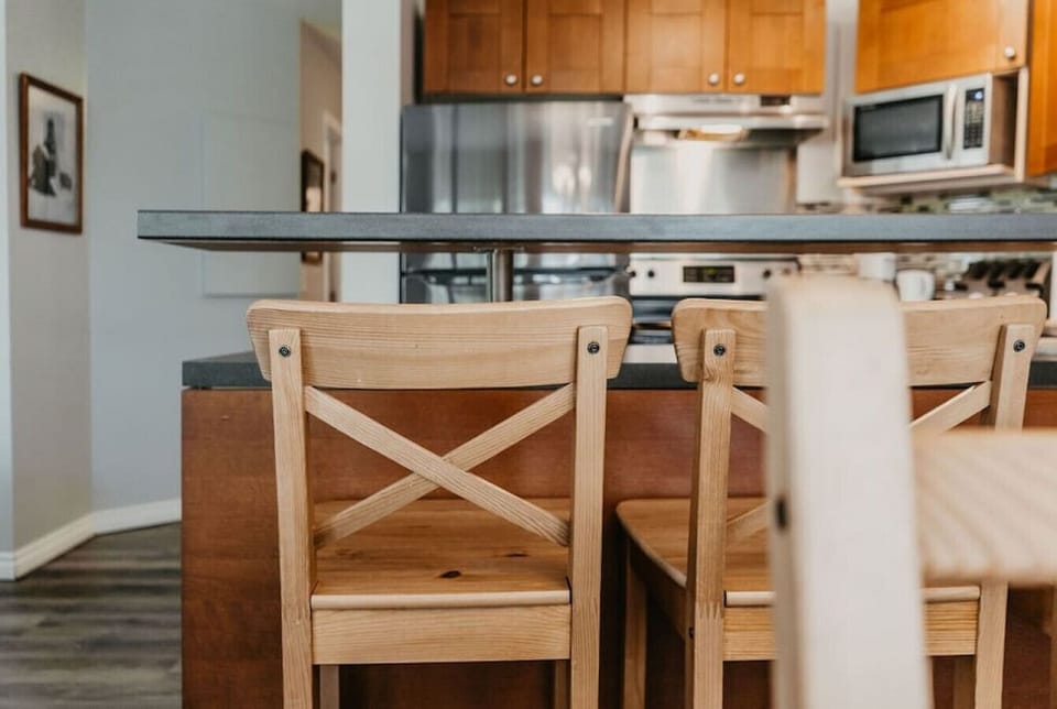 Enjoy your morning coffee at the raised kitchen island.