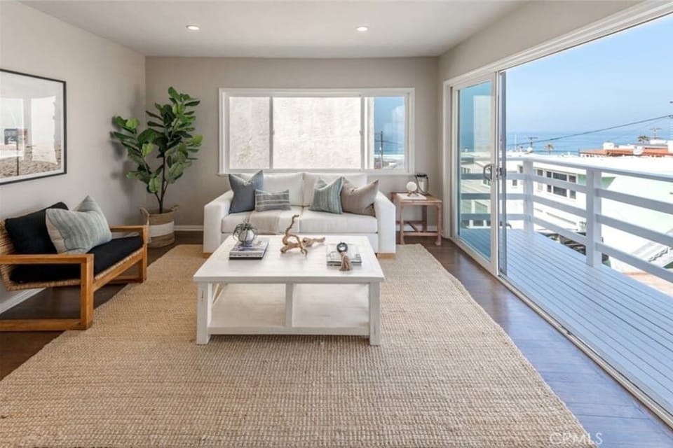 Living room opens up to outdoor living 
