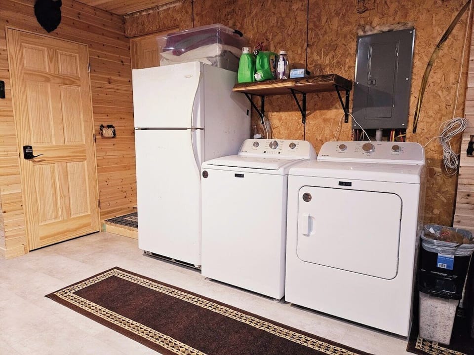 Washer and dryer in mud room stocked with supplies you may use during your stay.