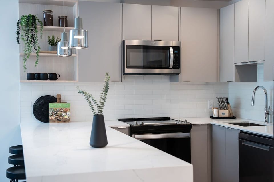 Condo | Private kitchen | Coffee/tea maker, full-size fridge, microwave, oven