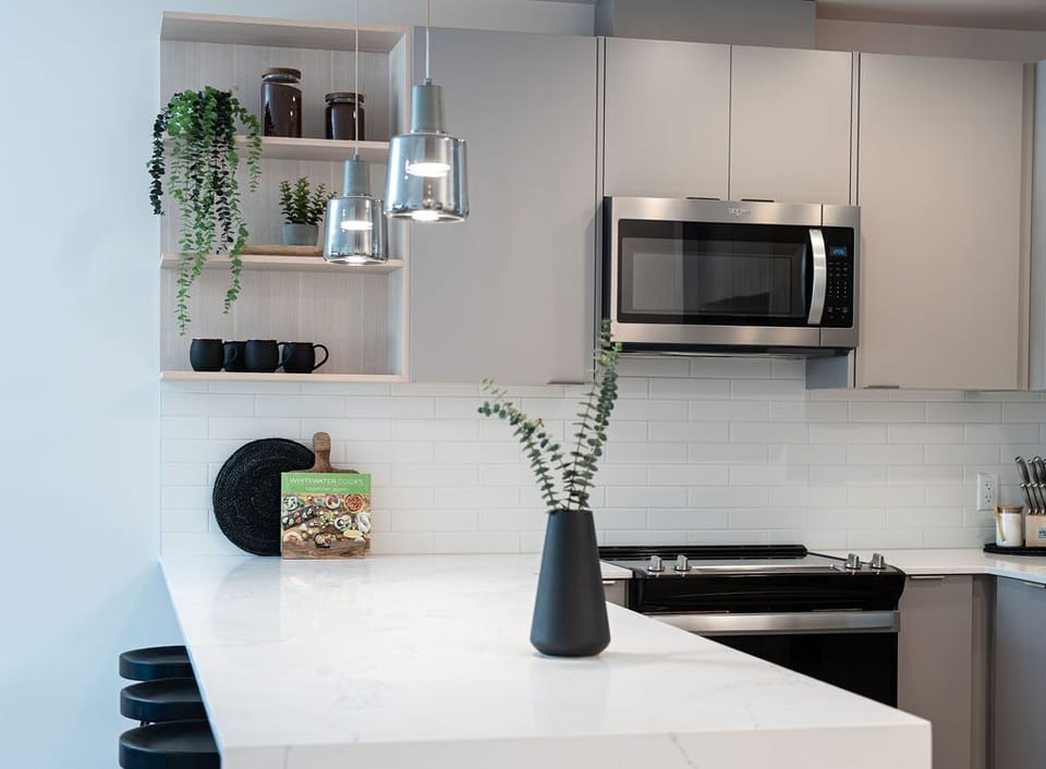 Condo | Private kitchen | Coffee/tea maker, full-size fridge, microwave, oven