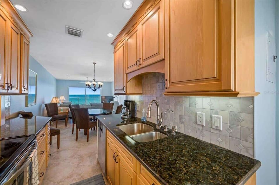 Fully equipped kitchen in our vacation rental with oceanfront view of Madeira Beach.