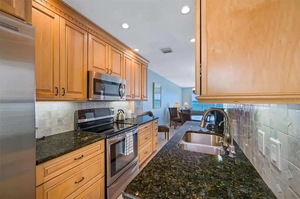 Fully equipped kitchen, with two types of coffee makers in our vacation rental with oceanfront view of Madeira Beach.