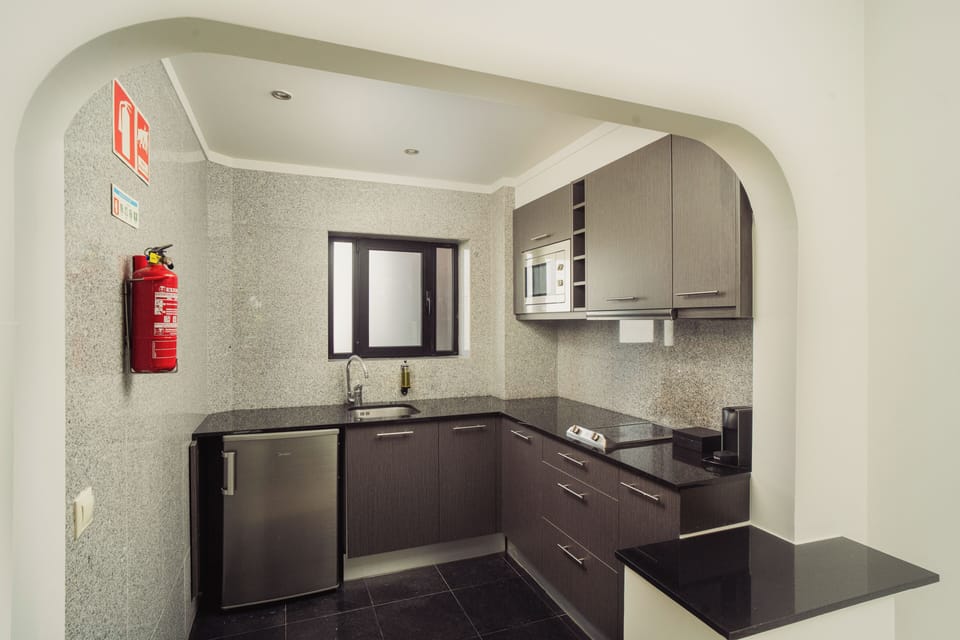Apartment, 1 Bedroom | Private kitchen | Coffee/tea maker