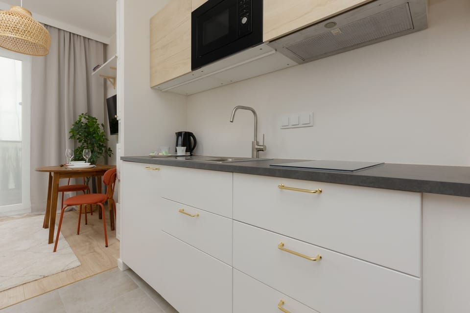 The kitchenette's practical layout maximizes space and functionality.