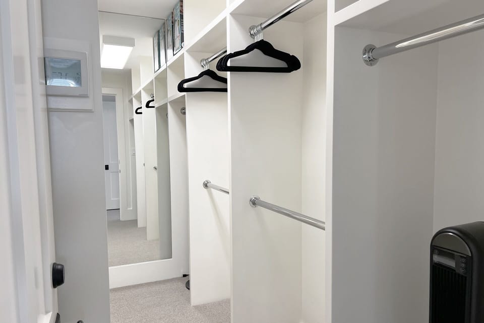 The Primary Suite offers a spacious walk-in closet.