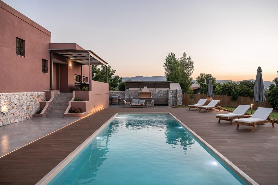 The luxurious pool area of the villa.