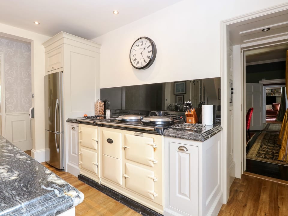 Fridge, electric kettle, toaster, cookware/dishes/utensils