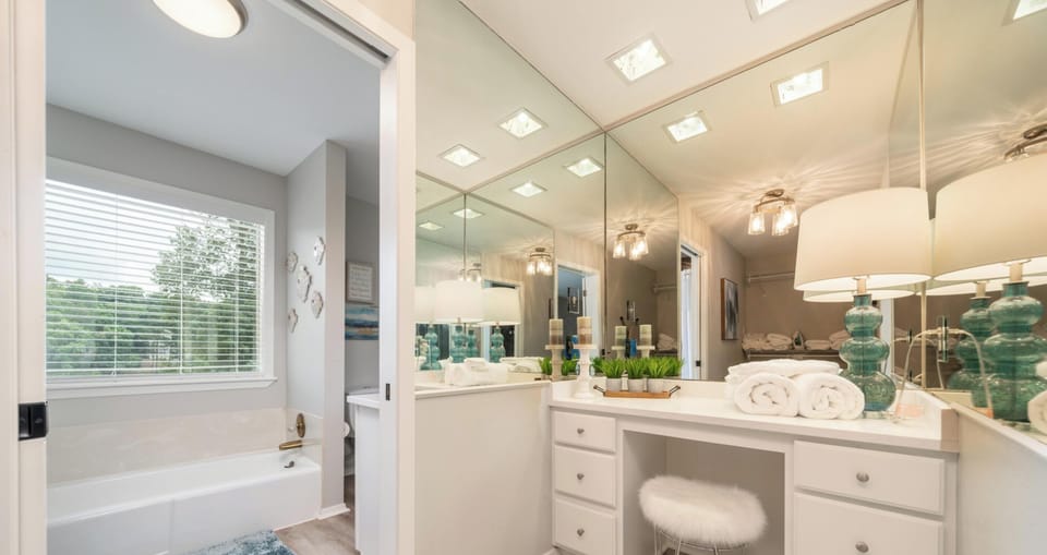 [Bathroom 1] En-Suite Bathroom with Bathtub and Large Tile Shower