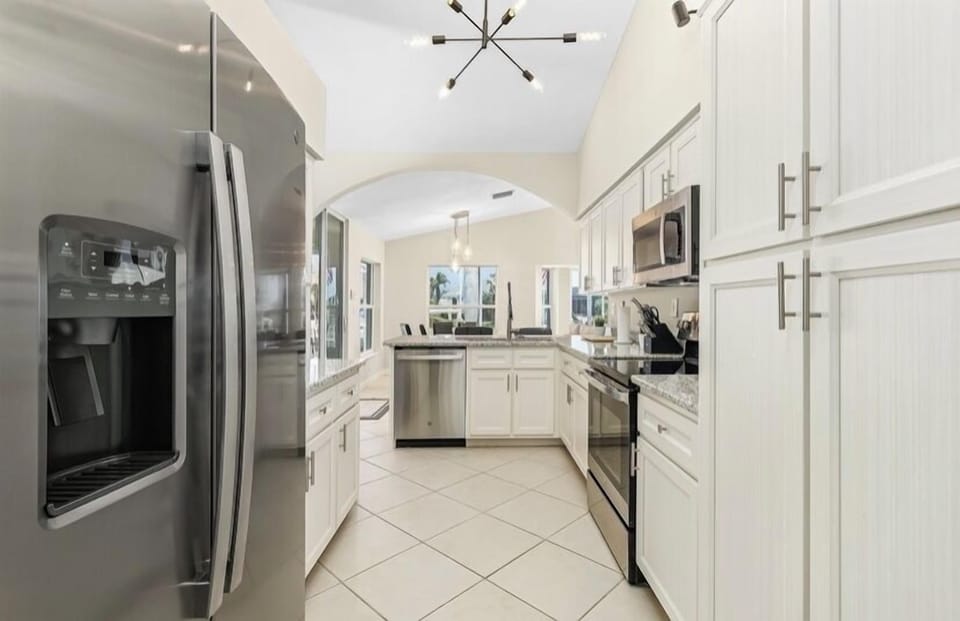 FULLY STOCKED KITCHEN WITH ALL NEW STAINLESS STEEL APPLIANCES