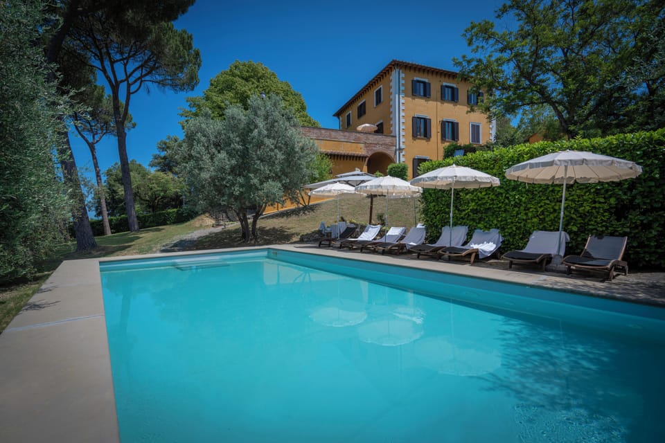 Seasonal outdoor pool, pool umbrellas, sun loungers