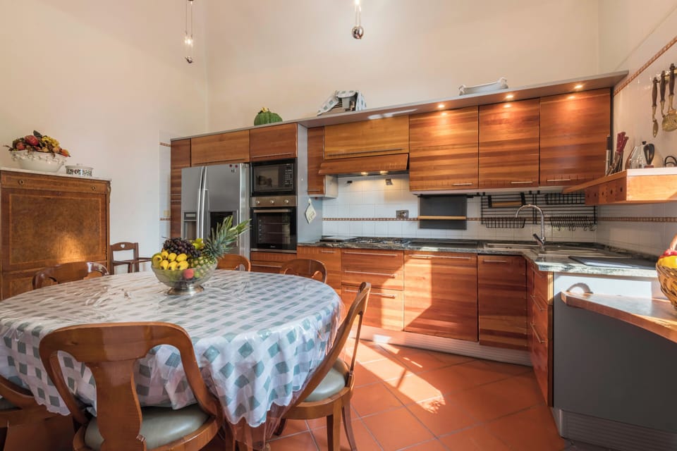 Villa | Private kitchen | Full-size fridge, microwave, oven, stovetop
