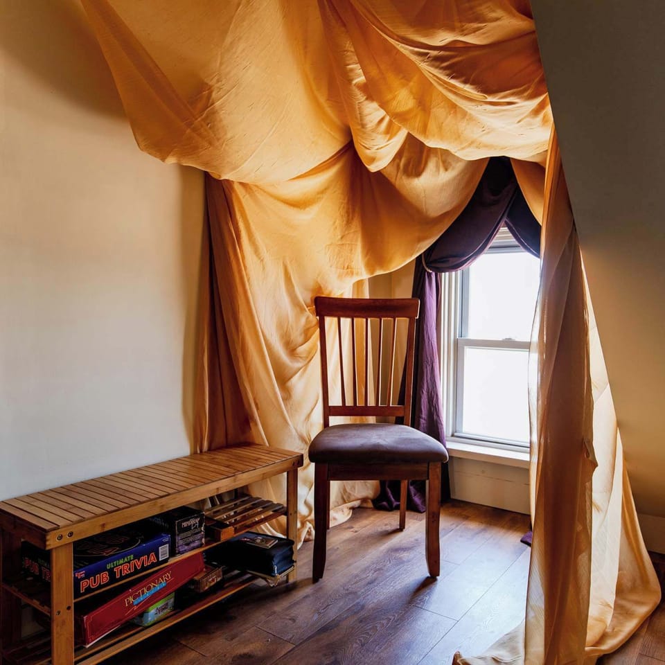 a selection of books and games are provided for guests use when weather encourages a cozy day spent inside.