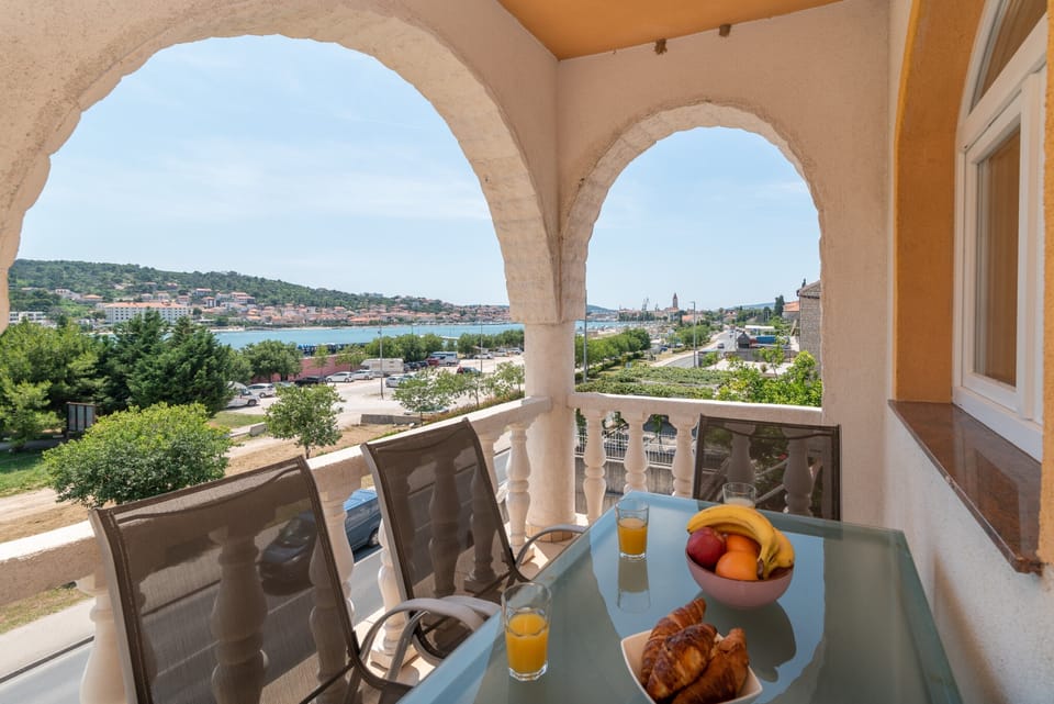 Balcony with sitting area & sea view