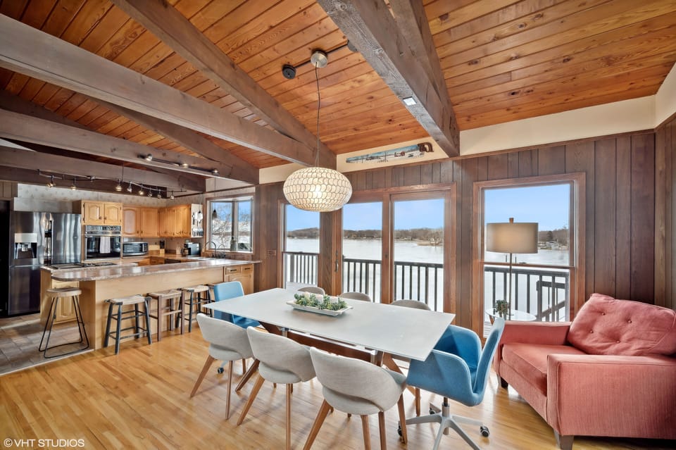 Gather around the large glass table with seating for 8 people!