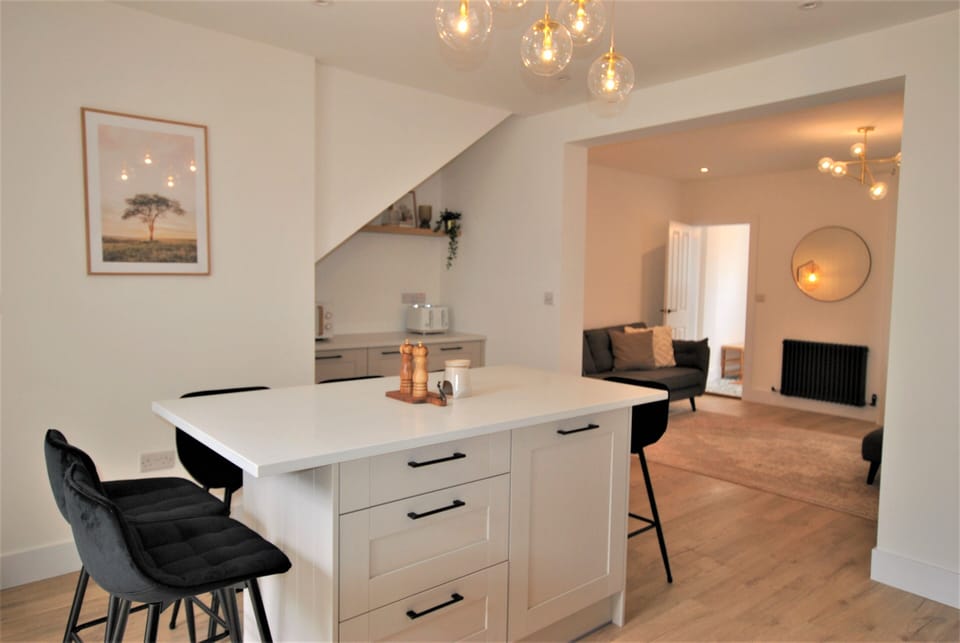 The kitchen opens up to the spacious lounge creating a social space