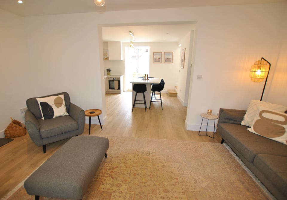 The open plan lounge and kitchen offers a fabulous social space