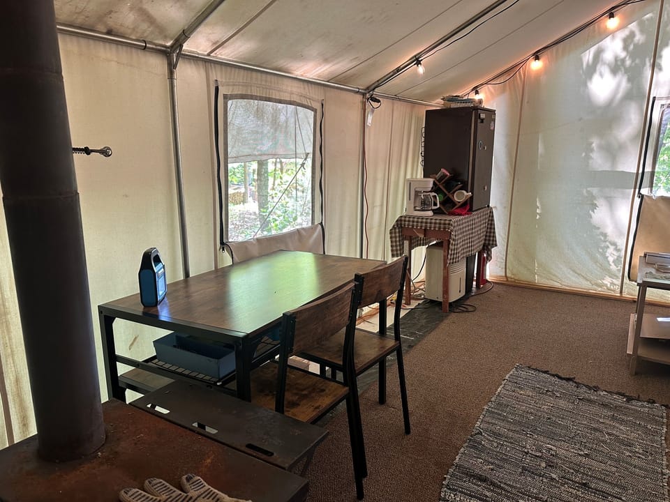 Dining area inside the homestead tent