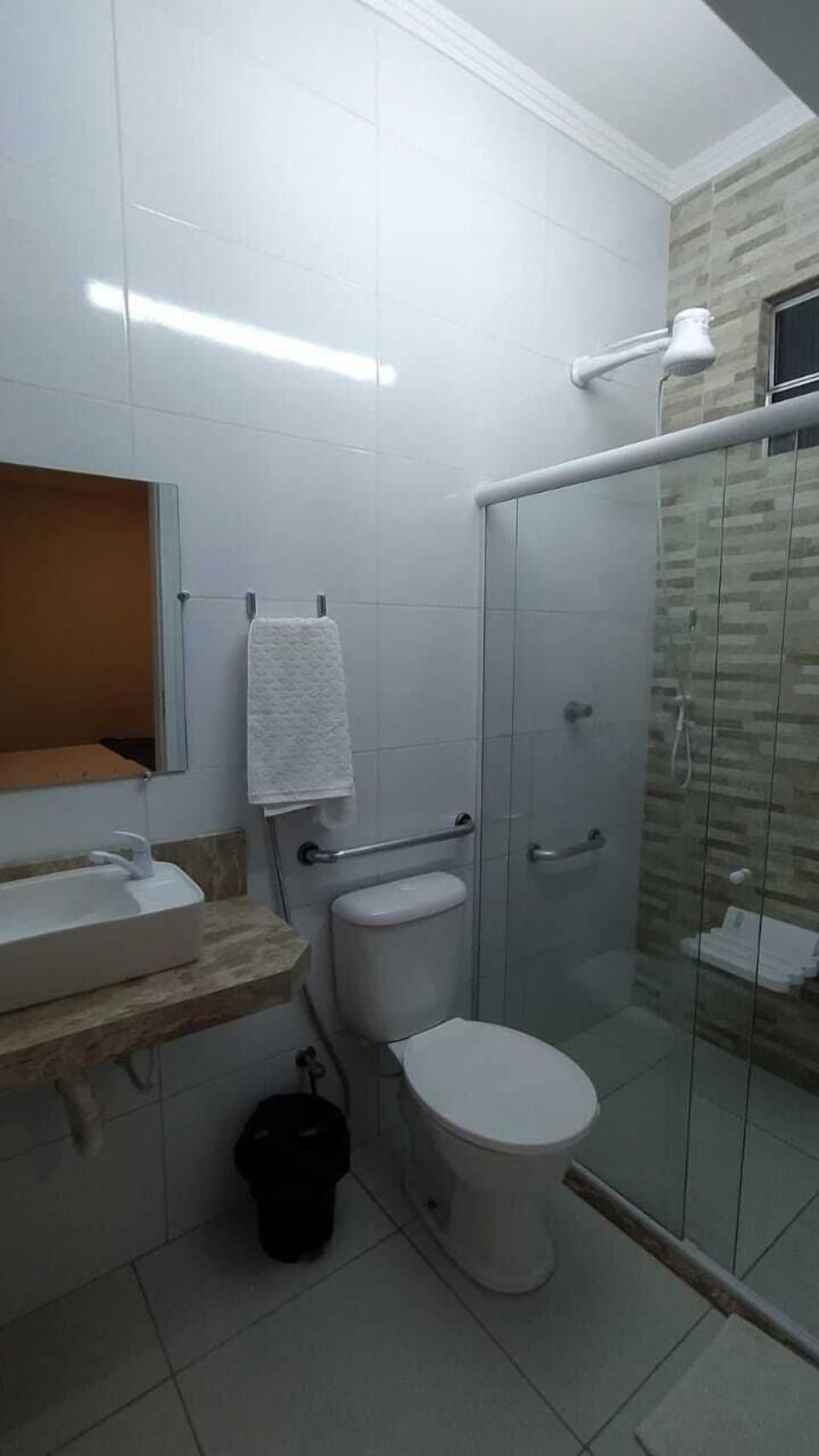 Shower, towels, soap, toilet paper