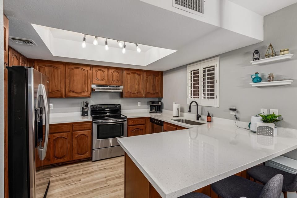 Quartz counter tops in this updated kitchen.