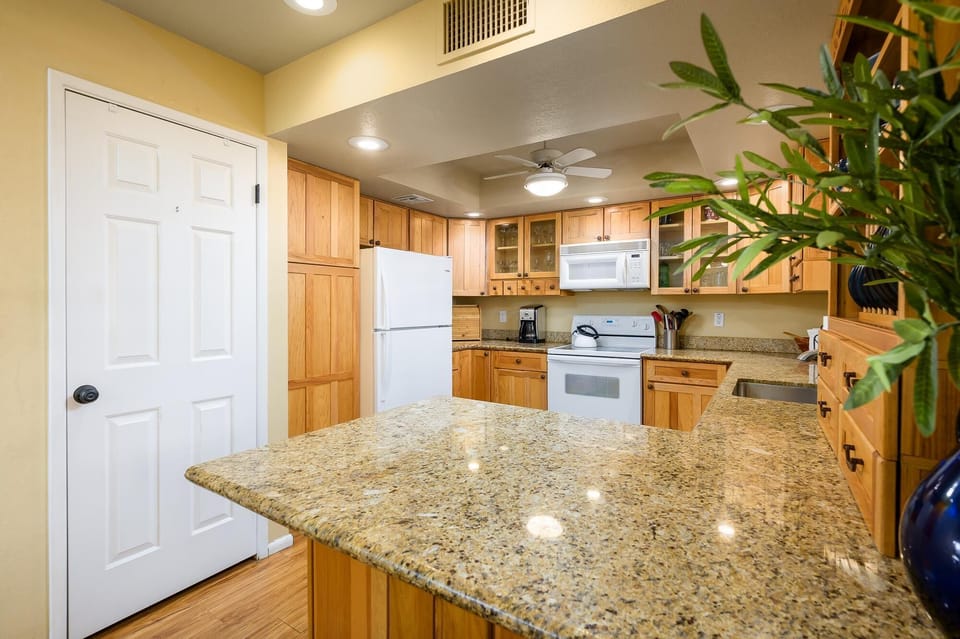 Granite counter tops in updated kitchen.