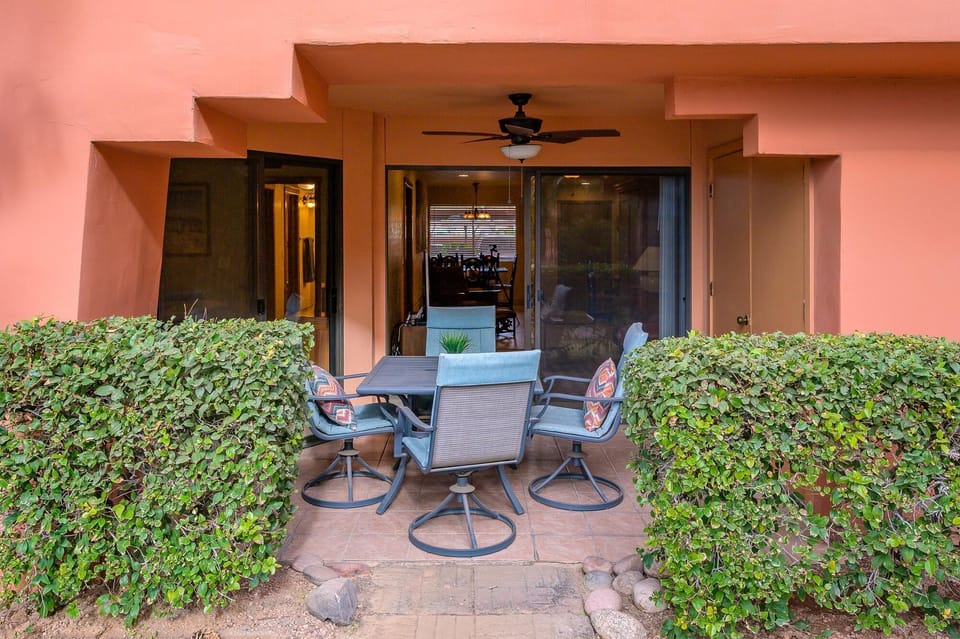 Patio just a few feet from one of 4 heated pools
