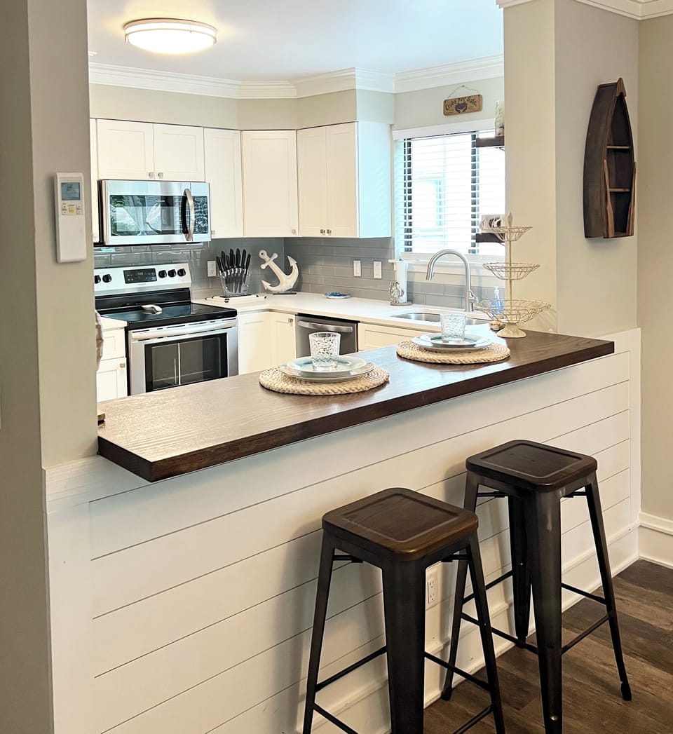 Start your day right at the kitchen island bar, sipping morning coffee