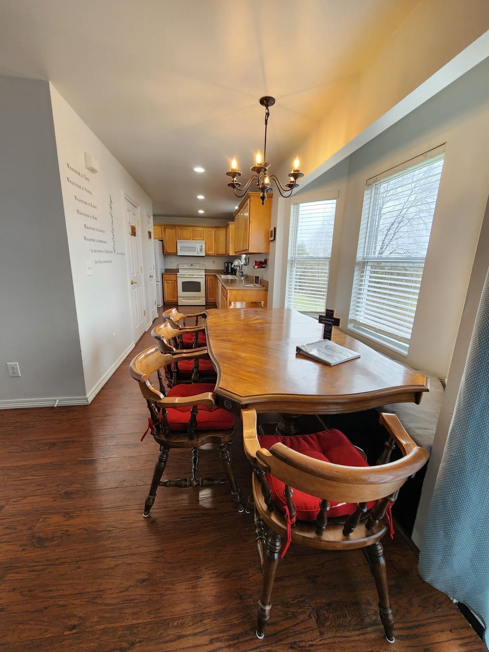 There is easily seating for 9 around the table.  Add more tables & chairs for 20