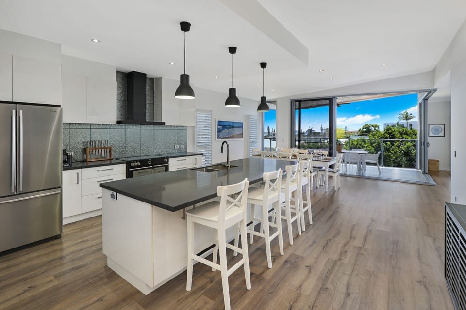 Deluxe House | Private kitchen | Full-size fridge, microwave, oven, stovetop