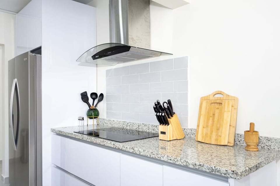 If you want to prepare more meals simultaneously, you can do so easily since the property features two additional kitchens in separate apartments.
