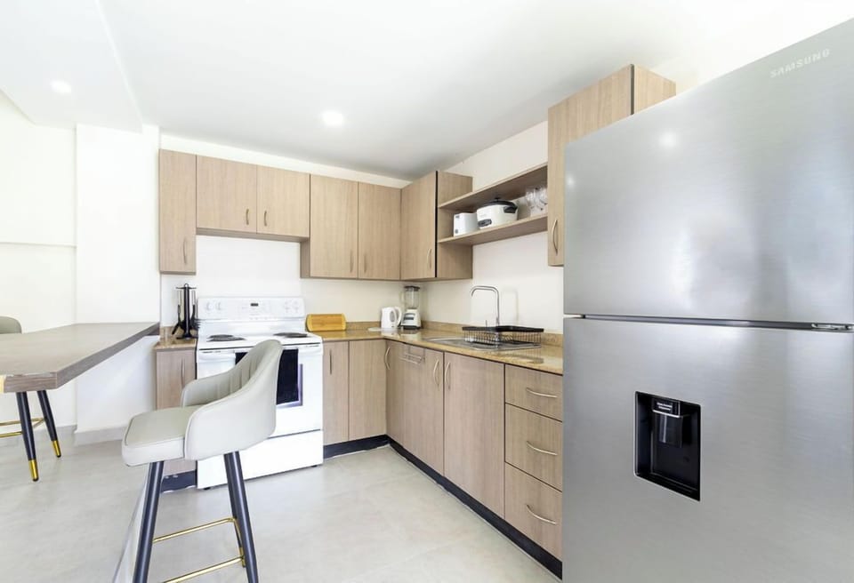 If you want to prepare more meals simultaneously, you can do so easily since the property features two additional kitchens in separate apartments.