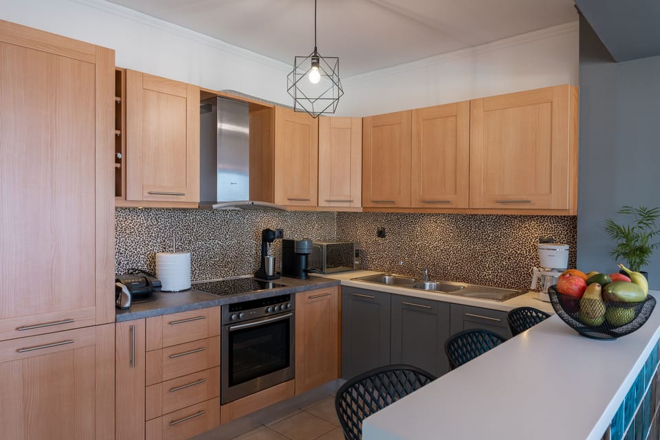 The fully equipped kitchen features all essential modern appliances