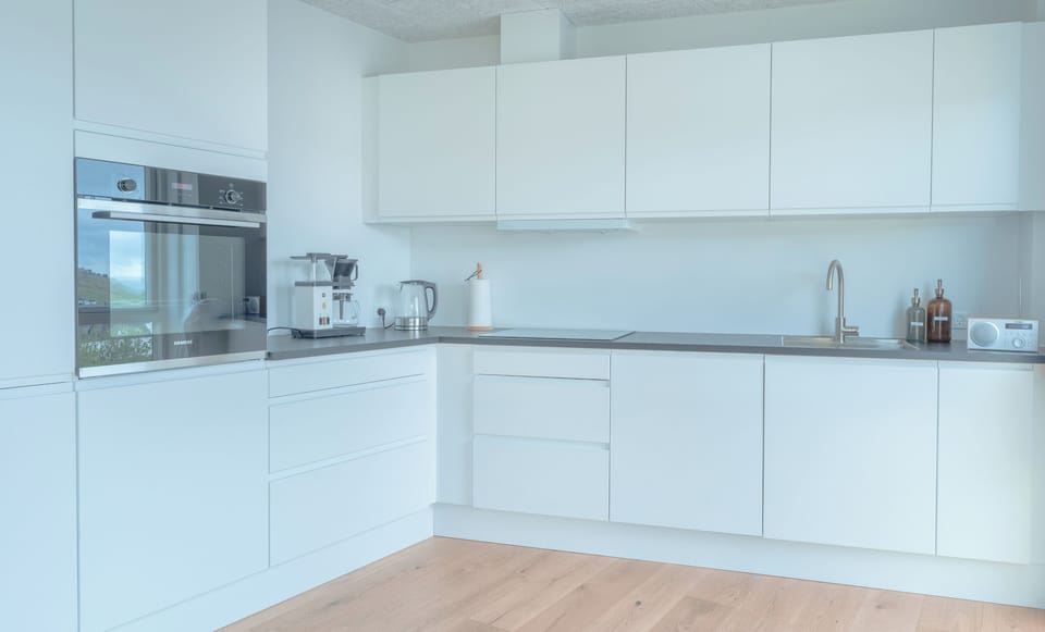 Apartment | Private kitchen | Coffee/tea maker, full-size fridge, microwave, oven