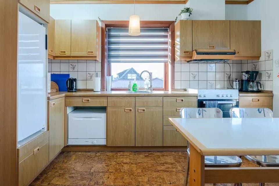 Apartment | Private kitchen | Coffee/tea maker, full-size fridge, microwave, oven