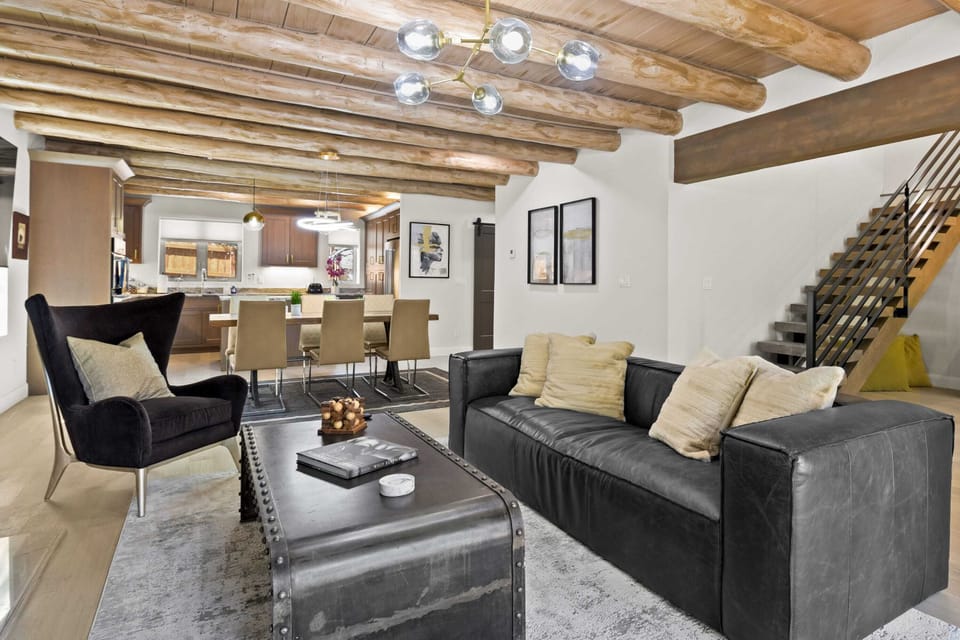 Living Room with sofas, tv, fireplace, walk out to porch (main level)
