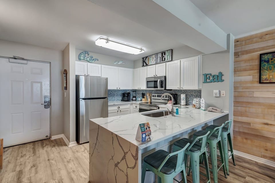 Condo, 2 Bedrooms | Private kitchen | Fridge, microwave, oven, dishwasher