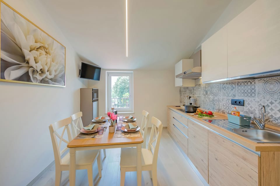 Standard Apartment, Multiple Bedrooms (Magnolia Apt - Palazzo Palermo 1817) | Private kitchen | Fridge, microwave, stovetop, dishwasher