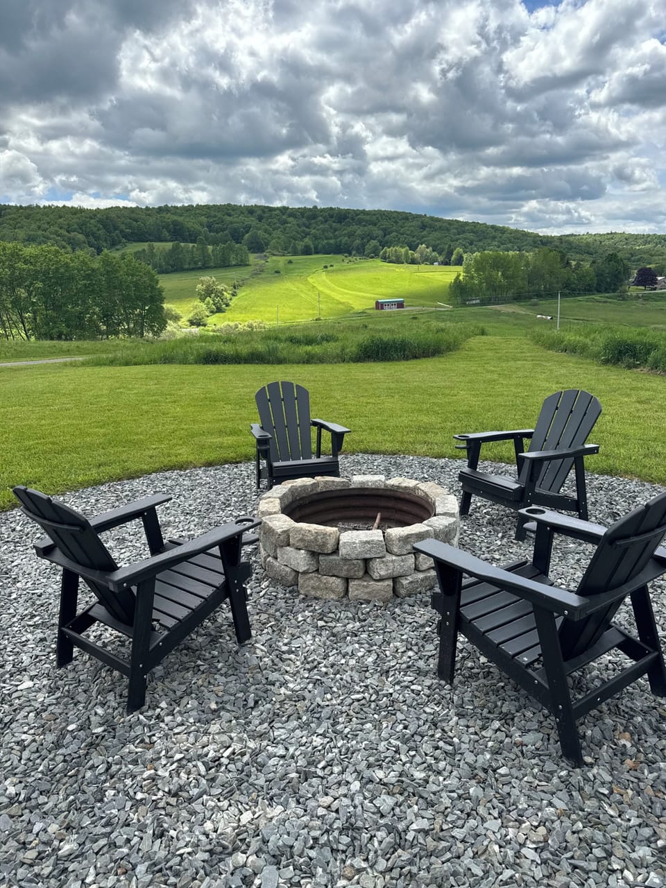 Fire pit with adirondack chairs
