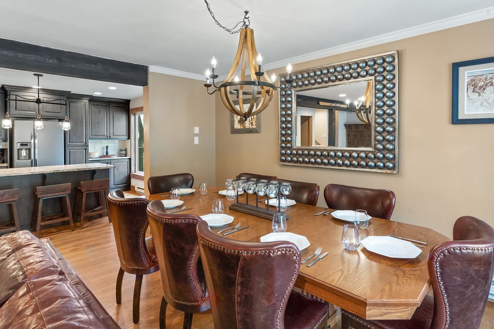 large table, 8 chairs, chandelier