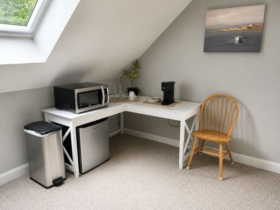 Kitchenette with fridge, microwave & coffee